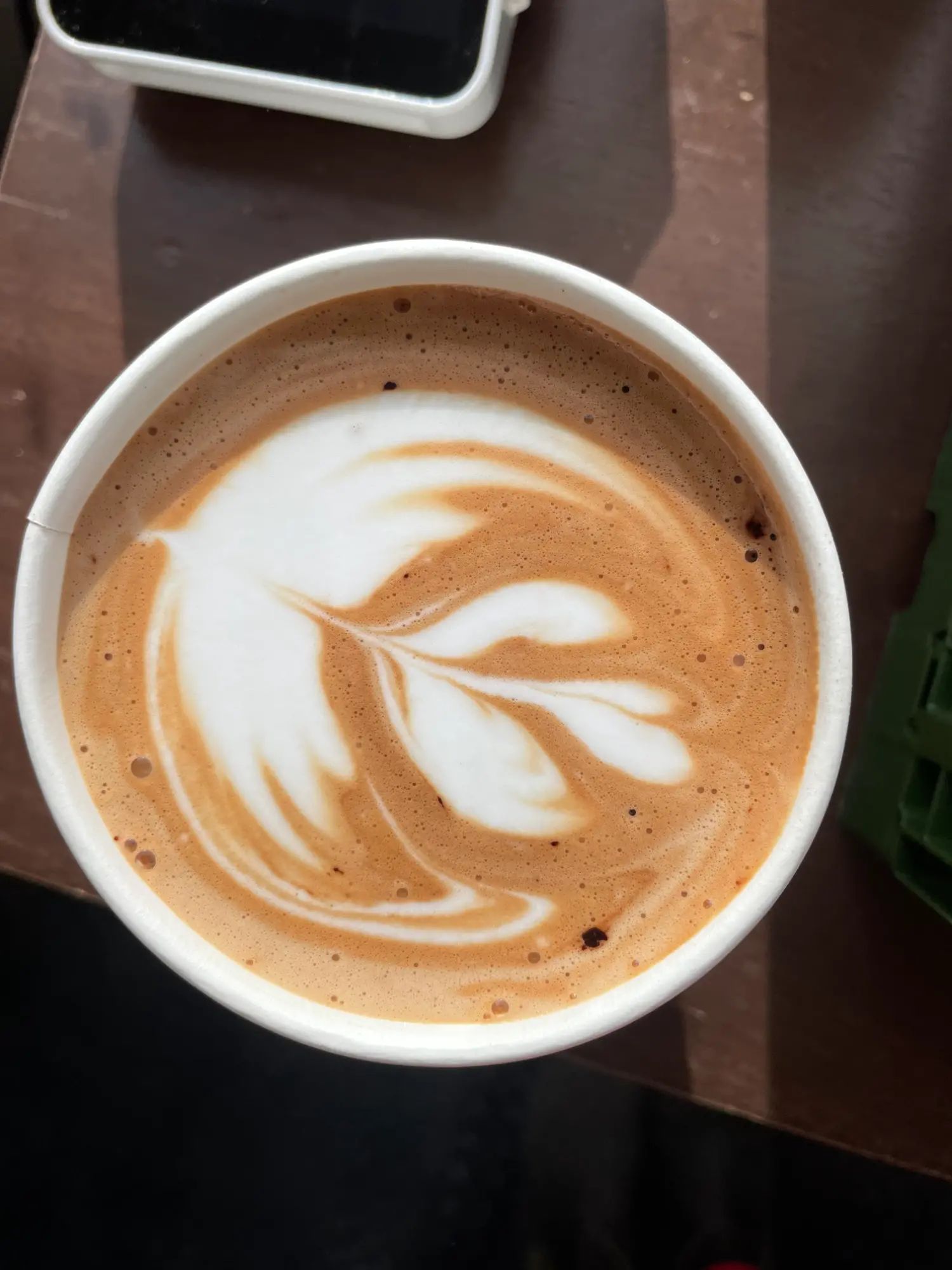 Latte with latte art from Upland Coffee